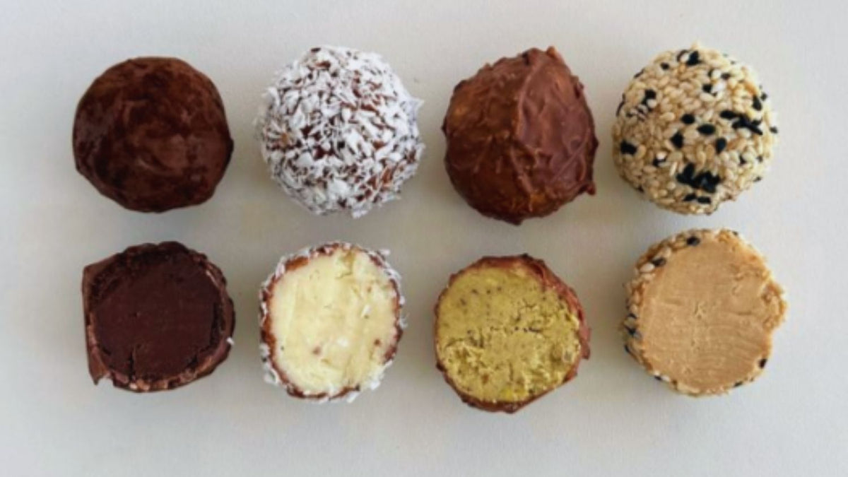 Prenatal bliss balls recipe for pregnancy nausea, with prenatal vitamin capsules opened into food